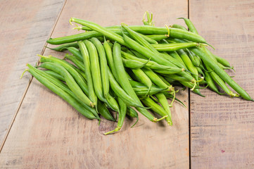 Fresh green beans on table