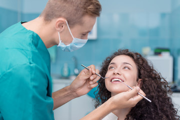 Dentist with the patient