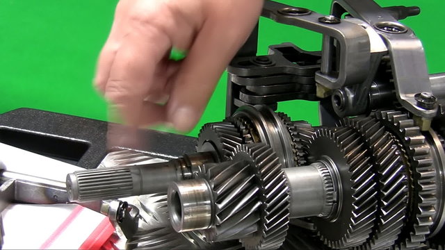 Dismantling car gearbox 4. Teacher showing parts