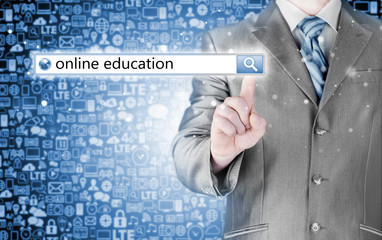 Online education written in search bar on virtual screen.