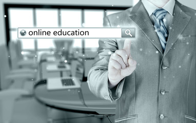 Online education written in search bar on virtual screen.