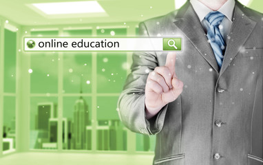 Online education written in search bar on virtual screen.