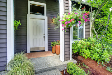 Entrance porch with blooming flowers