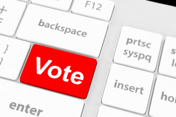 vote button on computer keyboard showing internet concept