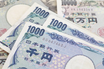 close - up japanese currency yen bank note and coin