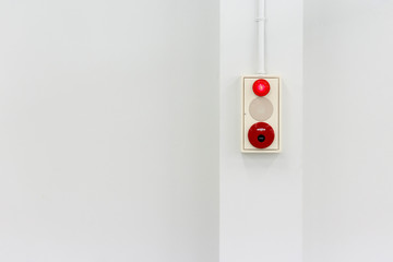 fire alarm on white wall
