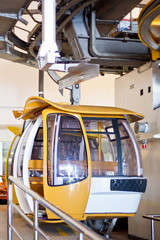 Yellow cabin on cable car station, genting mountains malaysia