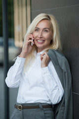 Businesswoman talking cellphone outdoor