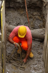 construction worker  in the excavation of a roadworks for the la
