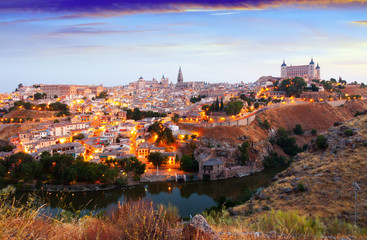 Fototapeta na wymiar view of Toledo from hill in summer morning