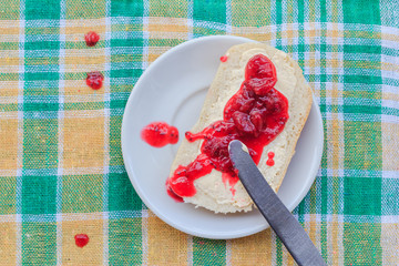 Wheat bread butter jam gooseberry