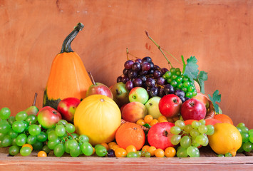 Wooden table full fresh fruit baskets