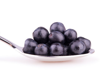 blueberries on spoon