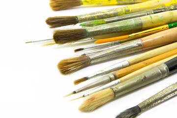 Fototapeta premium Paint brushes on white bcakground