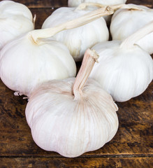 garlic fruit on wood table close up