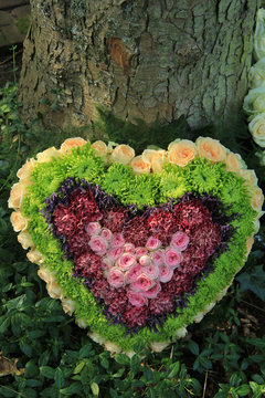 Heart shaped sympathy flower arrangement