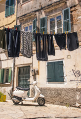 moped and laundry on corfu island