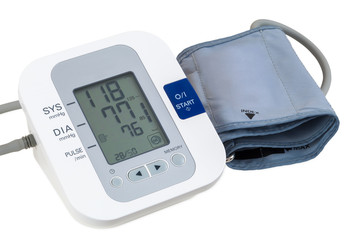 Digital blood pressure monitor on white background