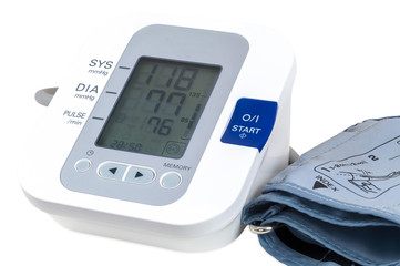 Digital blood pressure monitor on white background
