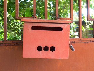 red iron mailbox on homepage