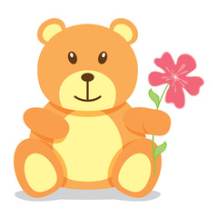 Little brown teddy bear holding a flower