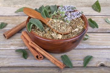 Homemade mint tea of the garden with flowers and leaves of mint