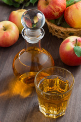 apple cider or juice in a decanter and glass