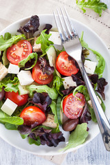 healthy salad with tomatoes olives and feta cheese