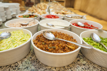 Selection of garnishes at a hotel buffet