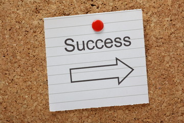 Success This Way reminder on a cork notice board