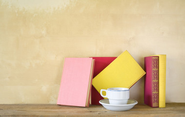 vintage books with a cup of coffee, free copy space