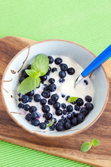 Fresh yogurt with blueberry and mint