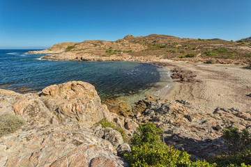 Fototapeta na wymiar Beach and rocky coastline of north Corsica