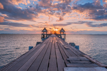 Landscape of Wooded bridge in the port between sunrise