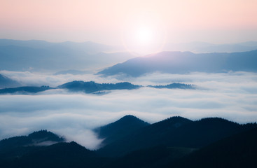 Mountains ridge at foggy morning