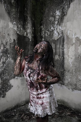 Zombie girl in haunted house