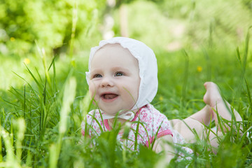 Baby girl in grass