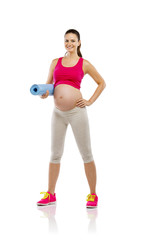 Pregnant fitness woman isolated on white