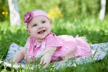 Baby girl in grass