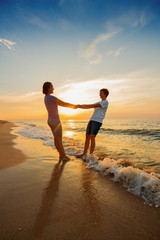 Boy and girl on the beach