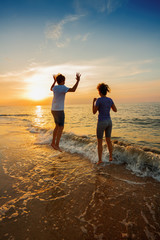 Boy and girl on the beach