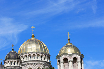 View of Christian Church cupola on blue sky background