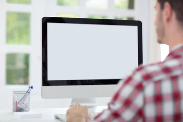 Foto op Plexiglas Man in front of computer screen © luckybusiness