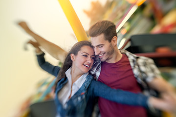 couple enjoy in riding ferris wheel