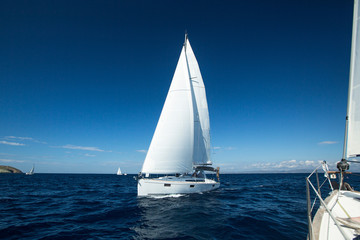 Boat in sailing regatta.