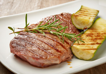 grilled beef steak and zucchini