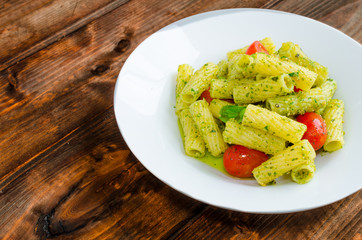 Rigatoni pasta with genoese pesto and sherry tomato