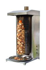 Shawarma vertical spit oven. Isolated on white background