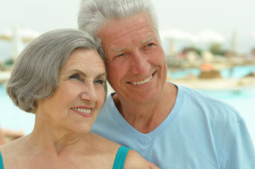 Senior couple by pool