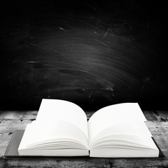 Book and blackboard